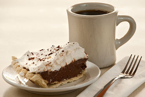 slice of chocolate pie with coffee
